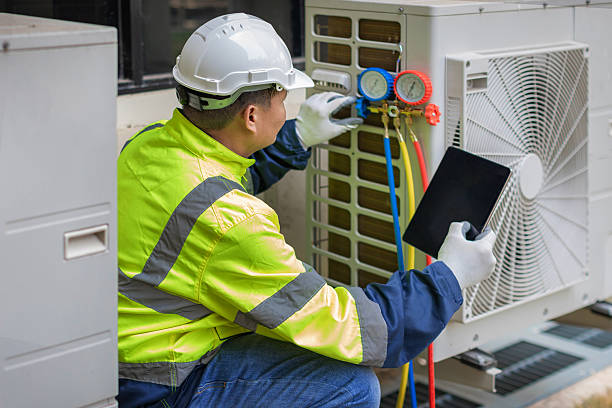 Professional Air Duct Cleaning technician working in Stanley, NC